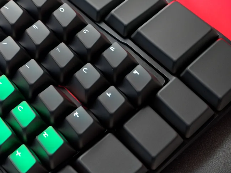 Close-up of a mechanical keyboard during a late-night data entry session.
