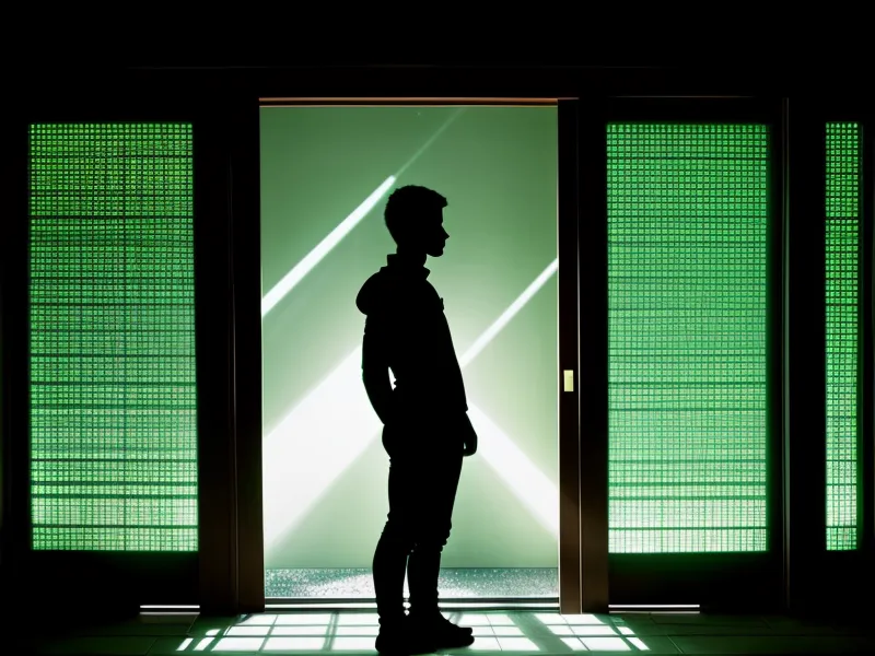 A person watching a data analyst working late at a computer